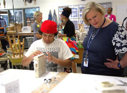 Art camp student with Kim Hill Director of Student Experience